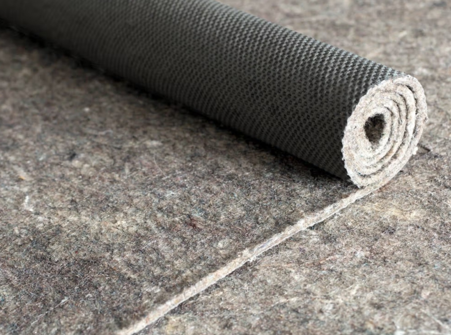 Duo-Lock Pad Roll showing felt and rubber backing